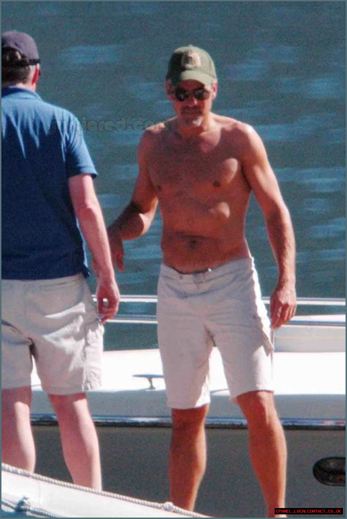 George Clooney shirtless out on his boat