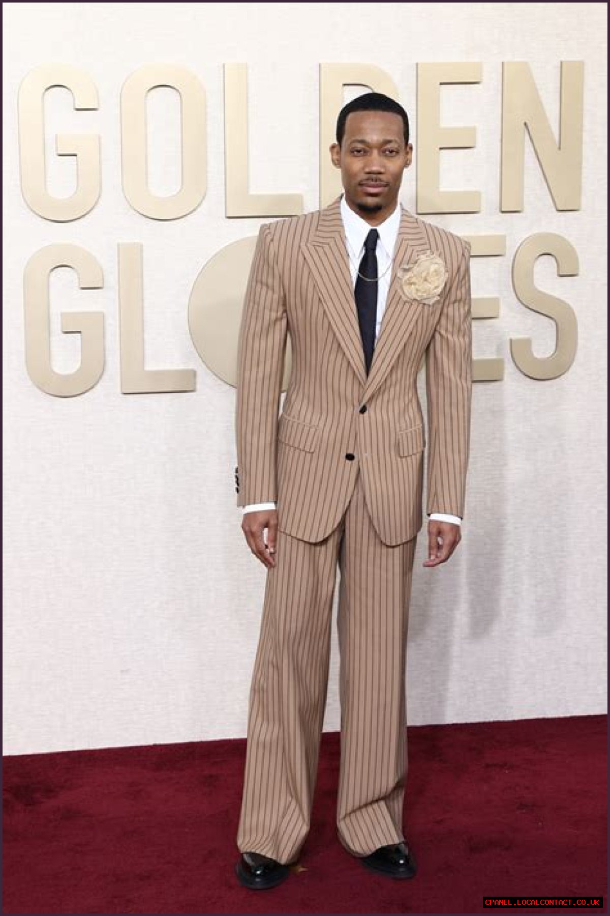 Tyler James Williams Dons Pin-striped Suit at Golden Globes 2024